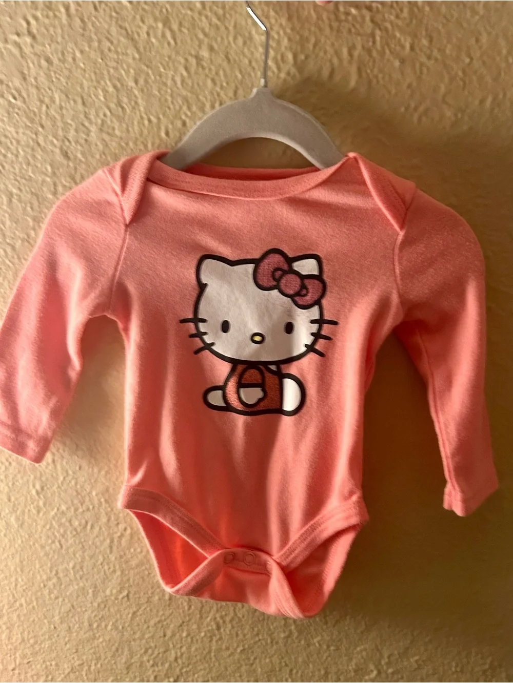 Hello Kitty Coral Pink Long-Sleeve One-Piece